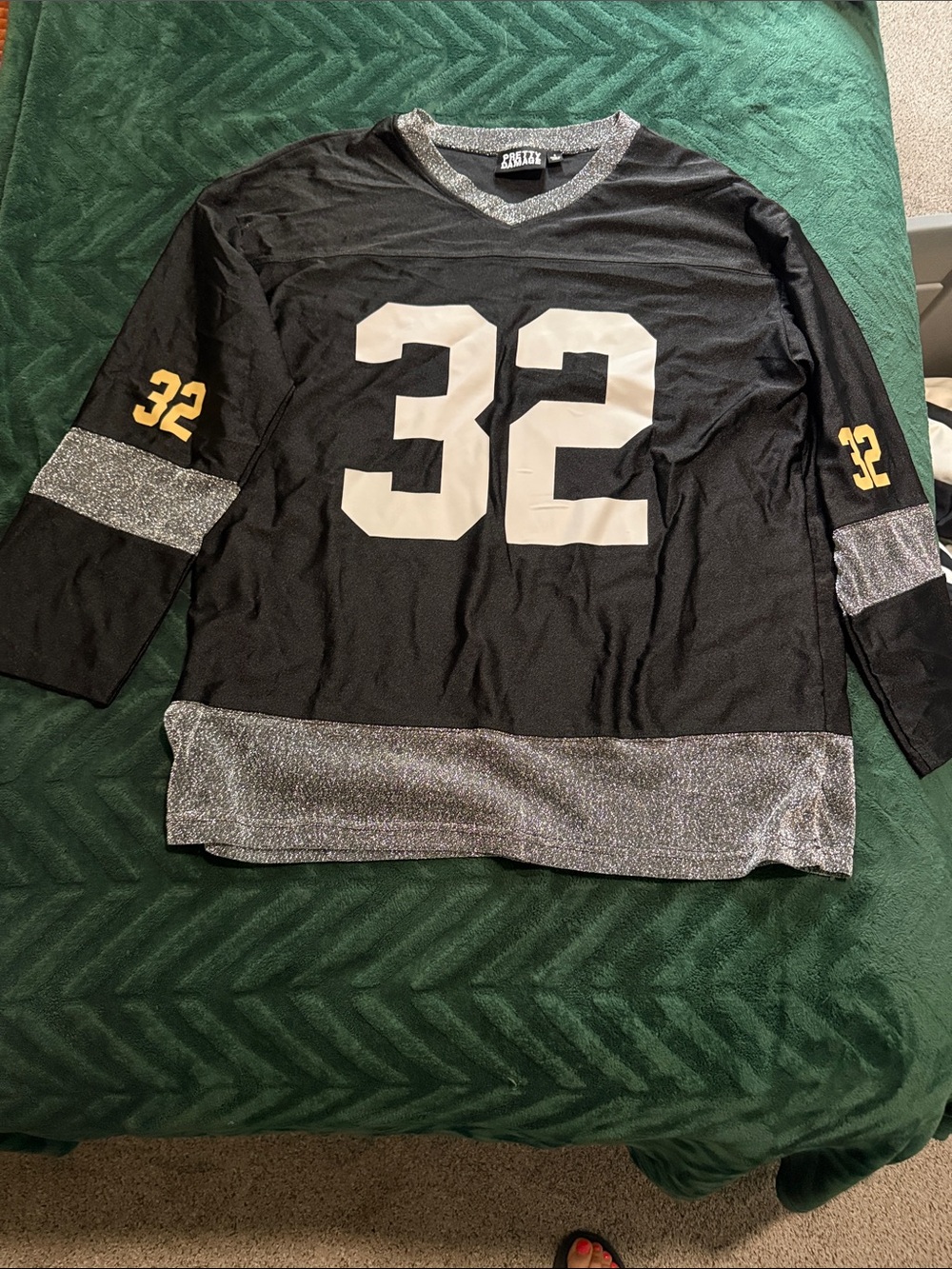 Black Athletic-Style Long Sleeve Shirt with White Number 32